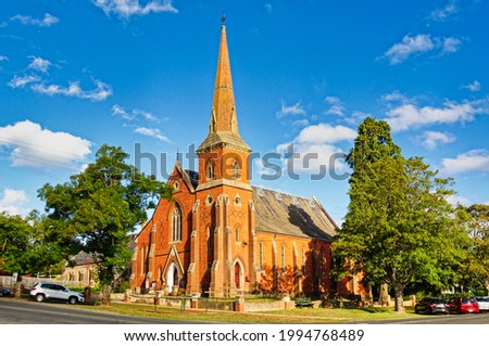 This impressive red brick Uniting Church, formerly known as the Wesleyan or Methodist Church, was built around 1865 - Daylesford, Victoria, Australia Royalty-Free Stock Photo #1994768489