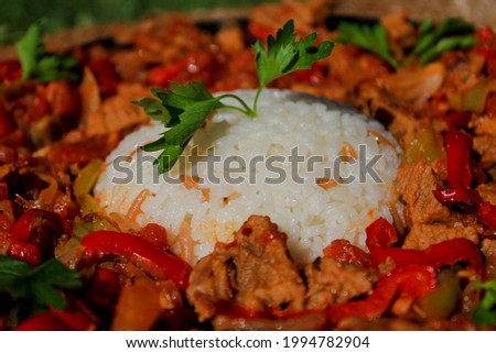rice meat pan parsley presentation