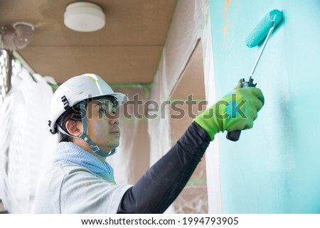 Japanese paint shop, young and talented craftsman, paint craftsman, Royalty-Free Stock Photo #1994793905
