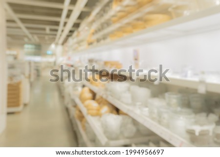 Abstract blurred background of shelf equipment and goods in department store, Vintage tone.