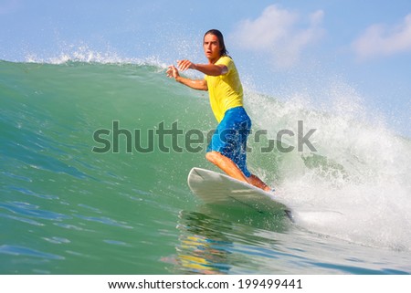 Picture of the Surfer in the Ocean.Lombok Island.Indonesia.
