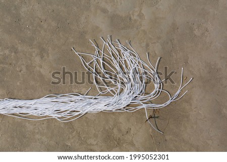 Dried fishing nets in the sand. Fishing nets close up views.