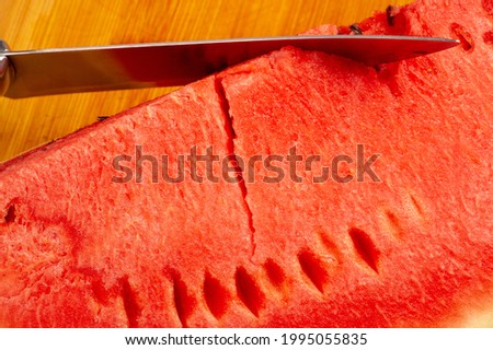 Watermelon Slices. the large fruit of a plant of the gourd family, with smooth green skin, red pulp, and watery juice Photo of food.