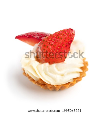 Close up tartlets with cheese and strawberry on a white background. Cooking concept. Healthy delicious dessert