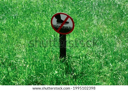 Sign Do not step on grass. Prohibition sign on the lawn. Sign prohibiting walking on the grass