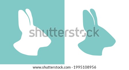 Cute vector illustration of a hand drawn bunny head on a white and pastel turquoise background, card or postcard design.