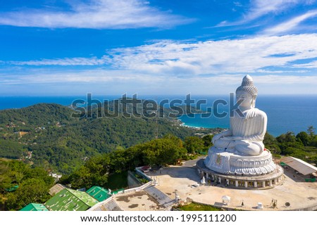 aerial photography Phuket big Buddha in sunny day
Phuket Big Buddha is one of the most important and revered landmarks on Phuket island.
white cloud in blue sky, blue sea and mountain background
