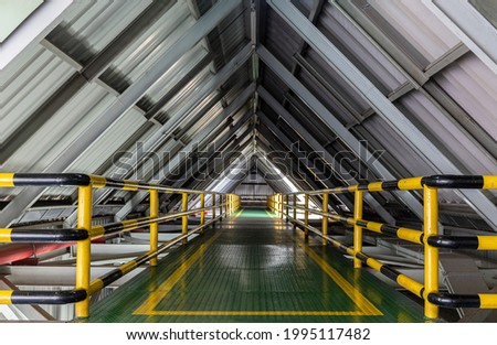 Roof walkways with in industrial plants. Royalty-Free Stock Photo #1995117482