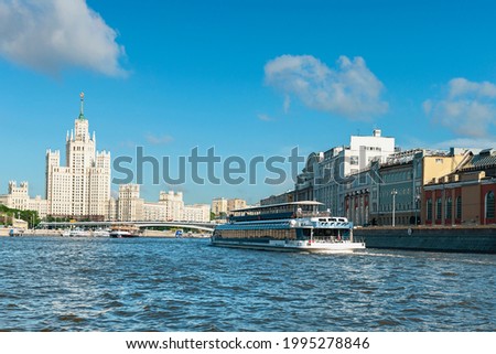 river tourist ships sail along the Moskva River near Kotelnicheskaya embankment