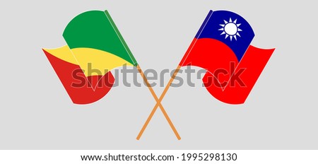 Crossed and waving flags of Republic of the Congo and Taiwan