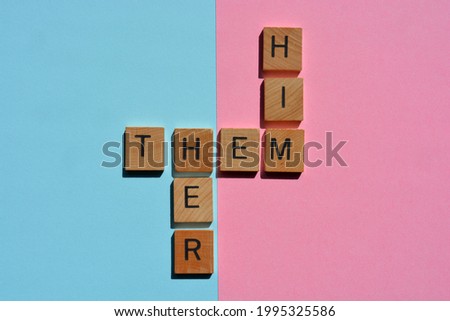 Him, Her, Them, gender pronouns in crossword form on pink and blue background