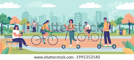 Modern green ecology city with park area, ecological transport and young people resting in the park Royalty-Free Stock Photo #1995353540