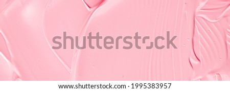 Pink lipstick or lip gloss texture as cosmetic background, makeup and beauty cosmetics product for luxury brand, holiday flatlay backdrop or abstract wall art and paint strokes. Royalty-Free Stock Photo #1995383957