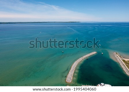 Aerial view of Lake Michigan from Elk Rapids, MI. Photo was taken during the early summertime. Drone Photography from above.