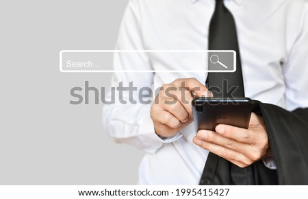 Businessman use smartphone for search page. Searching information data on internet networking.