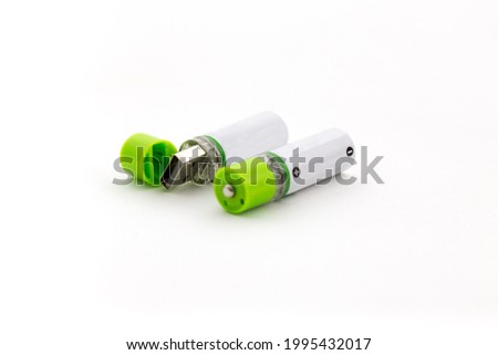 
Rechargeable batteries with built-in USB charger 2 pcs. Nickel metal hydride elements. AA finger. Charge via any compatible USB port or Ni-MH battery charger. White background. Royalty-Free Stock Photo #1995432017