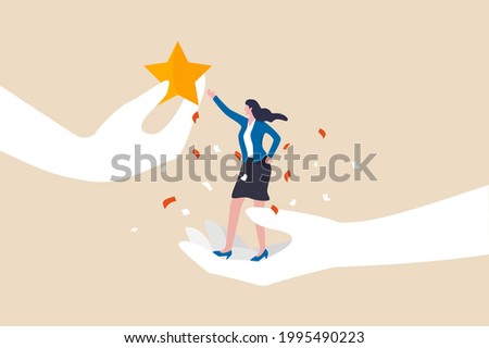 Employee success recognition, encourage and motivate best performance, cheering or honor on success or achievement concept, winning confidence businesswoman standing on big hand getting star reward. Royalty-Free Stock Photo #1995490223