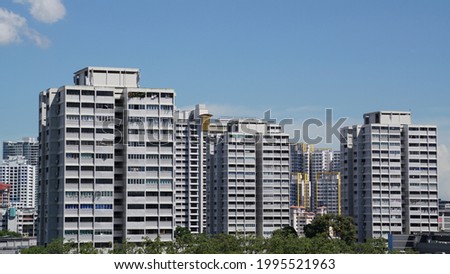 Blocks of public housing by Housing and Development Board in Singapore  Royalty-Free Stock Photo #1995521963
