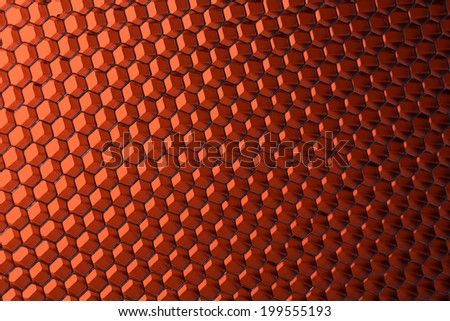 orange abstract texture honeycomb in the closeup and whole background