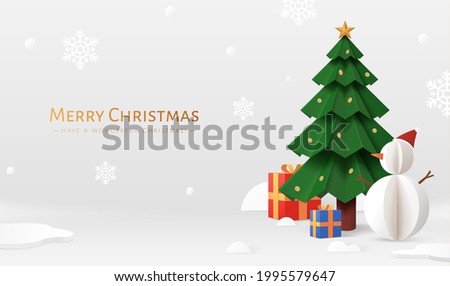 Grey Xmas banner in paper cut style. Illustration of decorated Christmas tree with snowman, gift boxes around, and snow fall over grey background