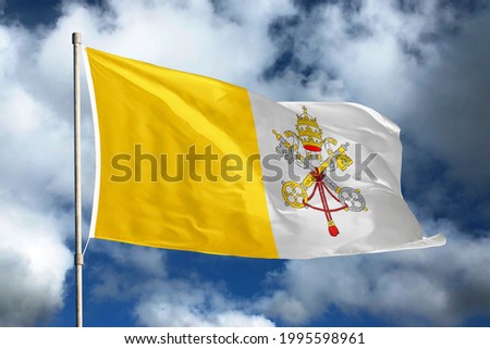 Vatican City flag on sky and cloud background. National symbols of Vatican City. Flag of Vatican City.