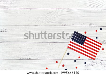 USA independence day background with American flag and blue red stars, space for text, design or product, 4 th of july concept. Royalty-Free Stock Photo #1995666140