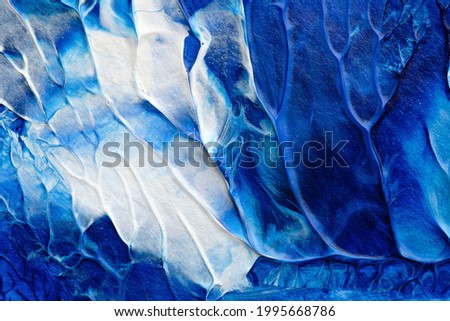 blue abstract acrylic painting color texture on white paper background by using rorschach inkblot method
