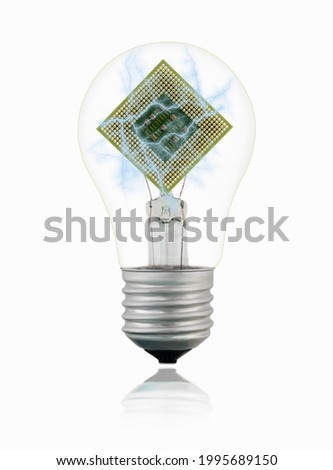 Isolated transparent tungsten light bulb with blue lightnings and processor on white background with reflection