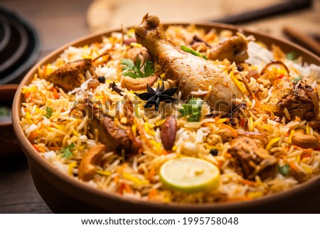 Dum Handi chicken Biryani is prepared in an earthen or clay pot called Haandi. Popular Indian non vegetarian food Royalty-Free Stock Photo #1995758048