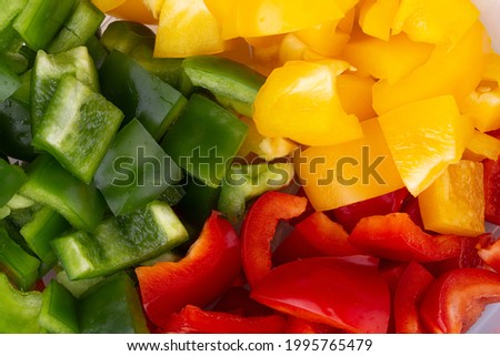 Sliced Red Bell Pepper Green Bell Pepper and Yellow Bell Pepper  on white background