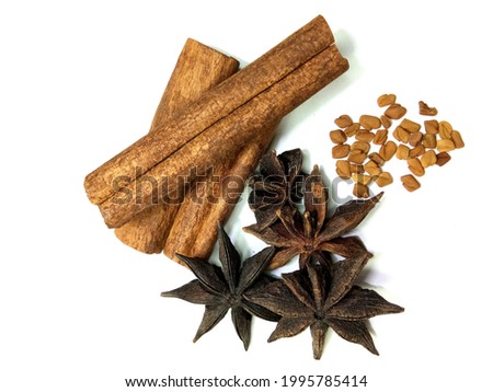 This is picture of spices and herbs namely cinnamon,star anise and fenugreek. They are used as an aromatic condiment and flavouring additive in cuisines, desserts and traditional foods.