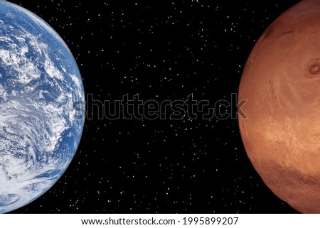 Mars and earth. Distance between them. Space for text. The elements of this image furnished by NASA.

