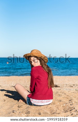 Beautiful young happy woman is smiling and laughing on the seaside. Hapiness. Sunset. Joy. Bodypositive.