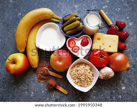 Foods high in probiotics and prebiotics. Natural food sources of probiotics and prebiotics. Healthy foods for gut health and good intestinal bacteria. Royalty-Free Stock Photo #1995950348