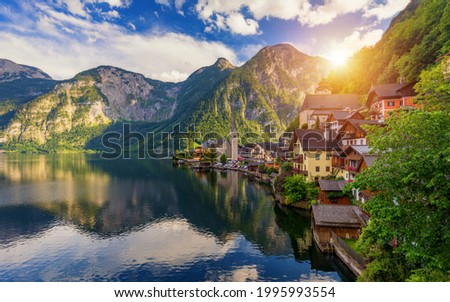 Scenic picture-postcard view of famous Hallstatt mountain village in the Austrian Alps, Salzkammergut region, Hallstatt, Austria. Hallstatt village on Hallstatter lake in Austrian Alps.
