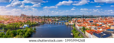 Prague scenic spring aerial view of the Prague Old Town pier architecture Charles Bridge over Vltava river in Prague, Czechia. Old Town of Prague with the Castle in the background, Czech Republic. Royalty-Free Stock Photo #1995994268