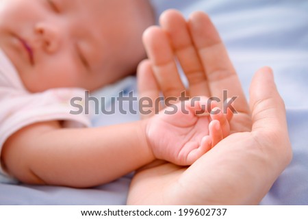 New born baby hand Royalty-Free Stock Photo #199602737