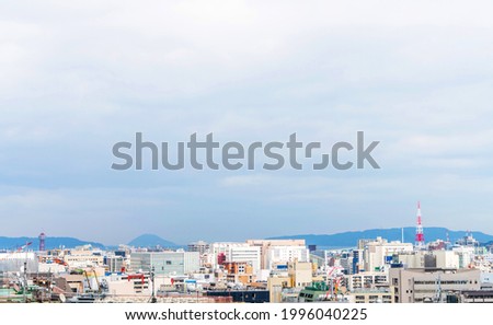 Asia Business concept for real estate and corporate construction - panoramic urban city aerial view under bright blue sky and sun in Fukuoka Japan