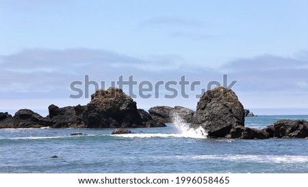 Rocks and Waves Off the Coast 
