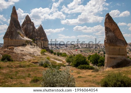 Cappadocia;  clear blue sky, Turkish Flag in the middle of fairy chimneys and a unique view