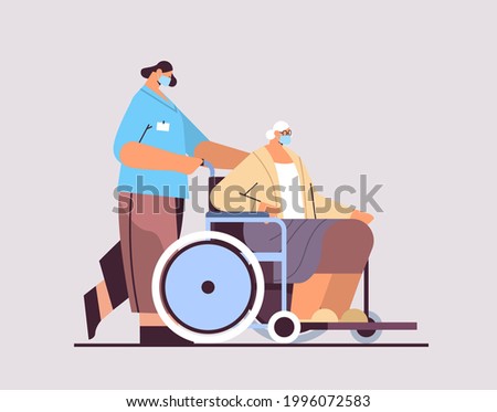 helper taking care of senior disabled patient nurse pushing wheelchair care service concept