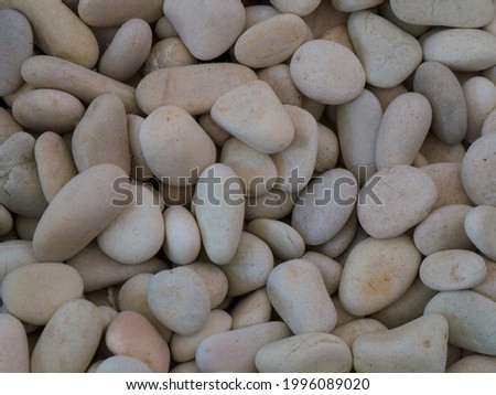 white stones as decorative element on a garden