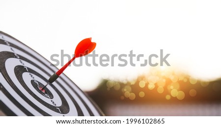 Dart is an opportunity and Dartboard is the target and goal. So both of that represent a challenge in business marketing as concept. Royalty-Free Stock Photo #1996102865