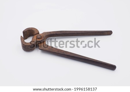 Old rusty pincers,isolated on white background Royalty-Free Stock Photo #1996158137