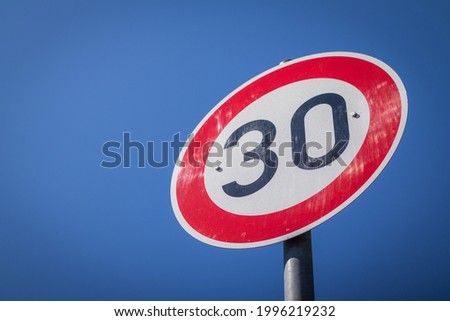 traffic sign with a speed limit of 30kmh 