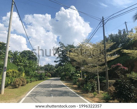 Empty road with the blue sky