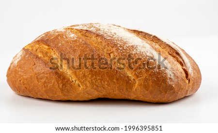Loaf of bread isolated on white background. Whole bread. Horizontal frame. Studio. Crispy bread roll isolated against white background Royalty-Free Stock Photo #1996395851