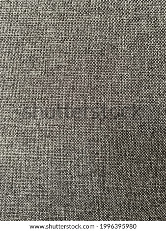 Textile of grey and black couch.