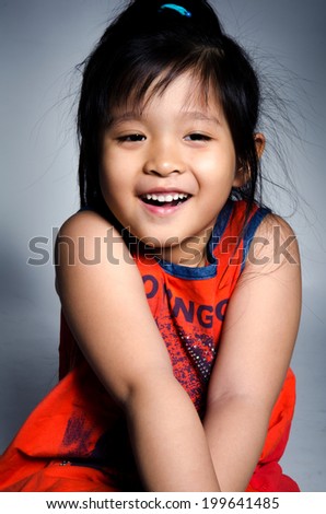 Portrait of happy asian cute Girl on white background .