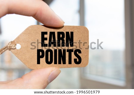 Word, writing, text Earn Points. Conceptual photo Loyalty Reward Benefit Program For Earning Customer Point written Sticky Note Paper Holding Hand with Finger.